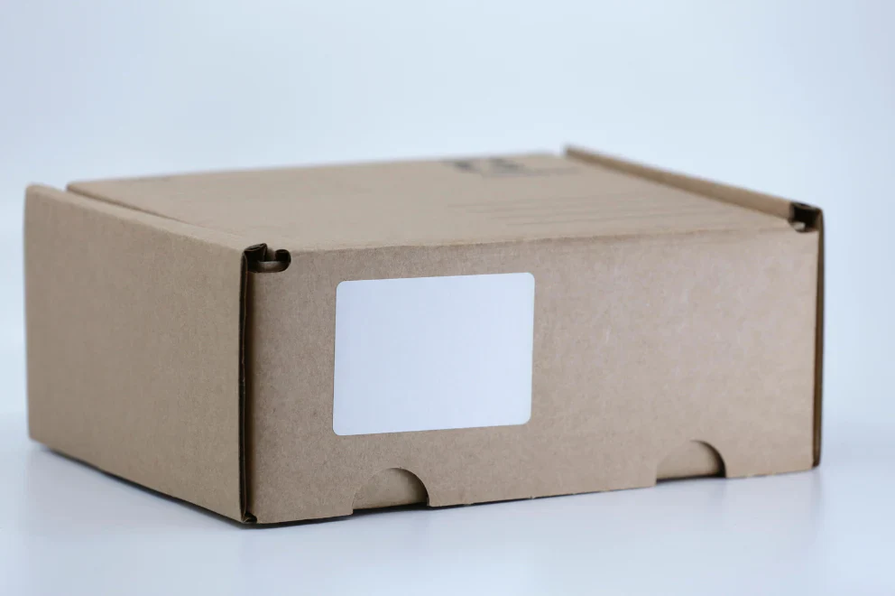 Custom branded cardboard shipping box with white label for private labeled optical transceivers and network components with specialty packaging
